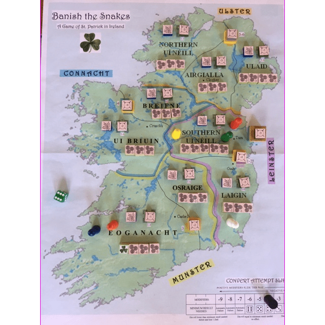 The Banish the Snakes Mounted Map Set by GMT Games features a detailed map of Ireland with regions, tokens, tiles, colored pieces, and dice, immersing players in St. Patrick’s legend through engaging board game play.