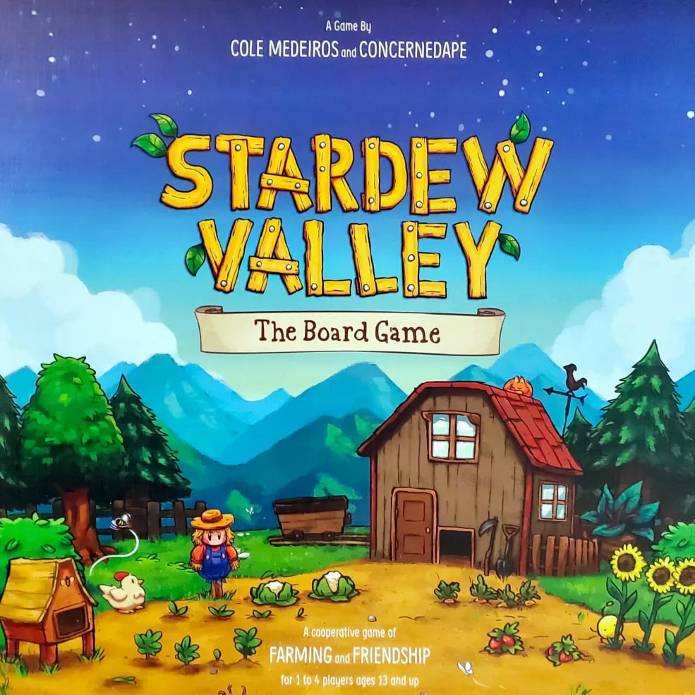 The cover of Stardew Valley: The Board Game by ConcernedApe features a vibrant farm with a barn, farmhouse, crops, animals, a farmer, and a dog under a blue sky. The title appears in large yellow letters. This cooperative game is inspired by the hit video