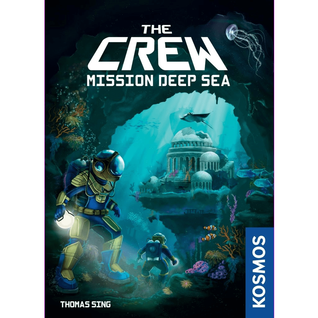 Two divers explore an underwater cave teeming with colorful coral, fish, and an ancient domed structure. A jellyfish floats above as the Kosmos cooperative card game, The Crew: Mission Deep Sea, title appears at the top.