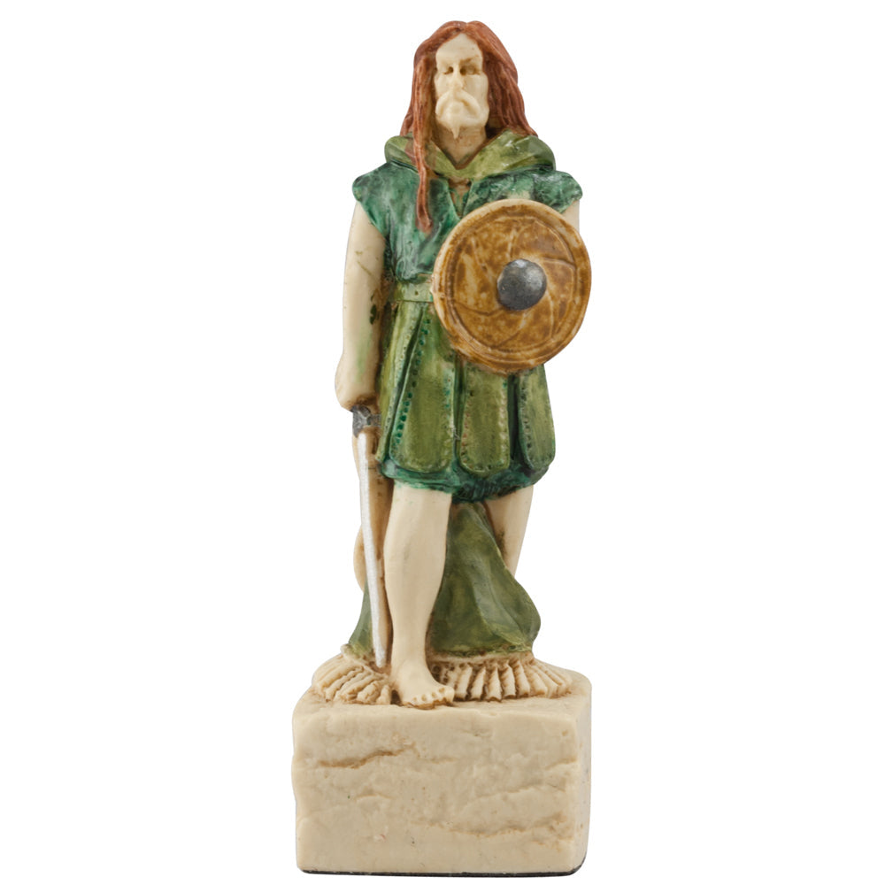 From Studio Anne Carlton Games, this Celtic & Viking Hand-painted Chess Pieces Set features a barefoot warrior with long red hair in a green tunic and cloak, holding a round shield and spear—ideal for any chess collection.