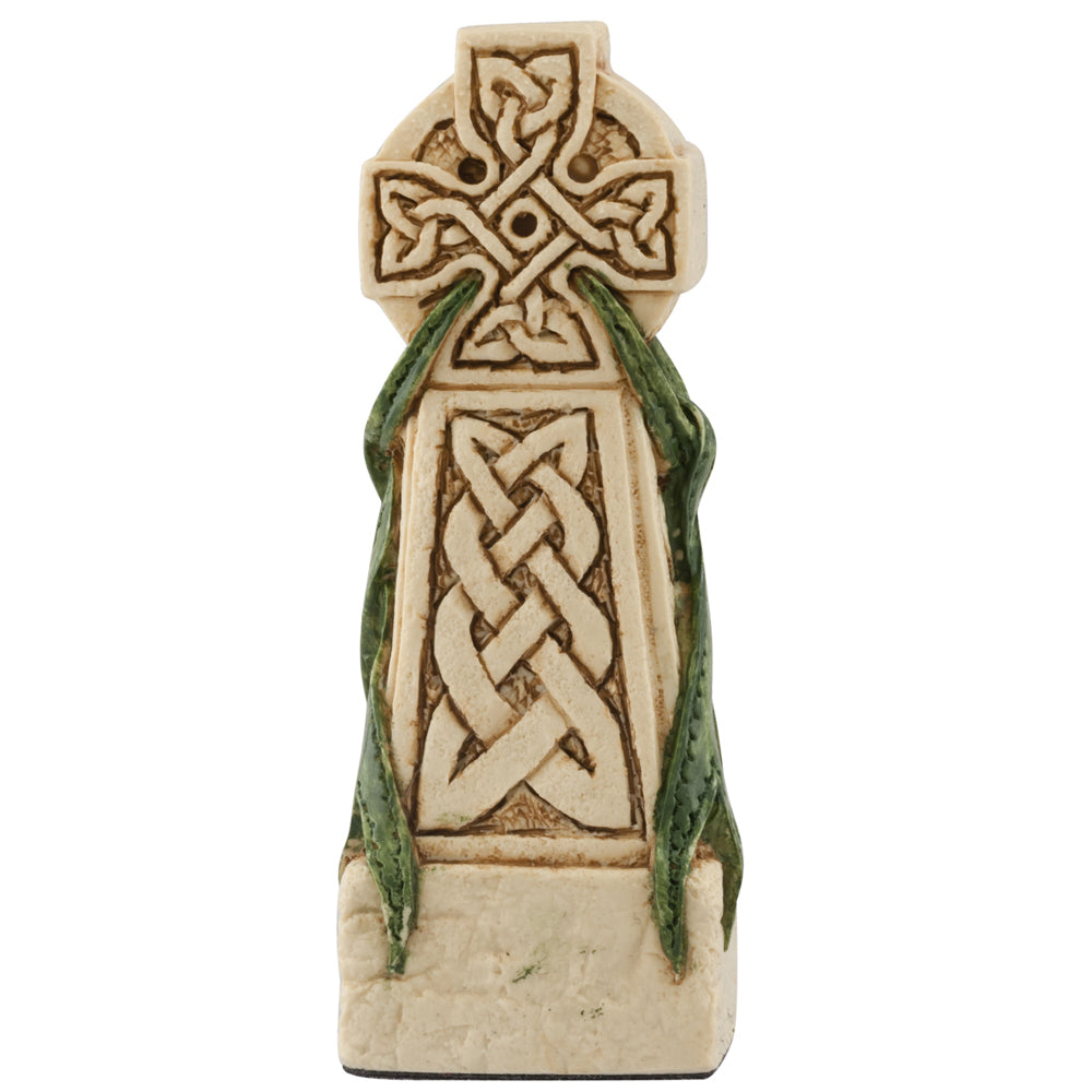 The Studio Anne Carlton Games Celtic & Viking Hand-painted Chess Pieces Set features a stone-like Celtic cross with detailed knotwork and green vines, evoking the artistry of traditional chess pieces and Viking chess sets.