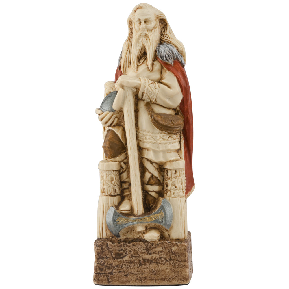 The Celtic & Viking Hand-painted Chess Pieces Set by Studio Anne Carlton Games includes a bearded Viking warrior in a red cape with an axe and fur-trimmed attire on a textured brown base—ideal for collectors of unique chess pieces.