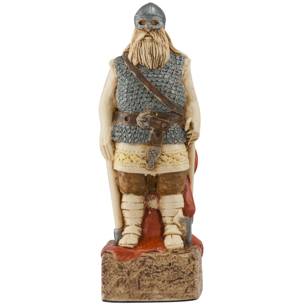 A hand-painted Viking warrior chess piece with helmet, chainmail, belt, and axe from Studio Anne Carlton Games’ Celtic & Viking Chess Set—an ideal addition to your chess collection.