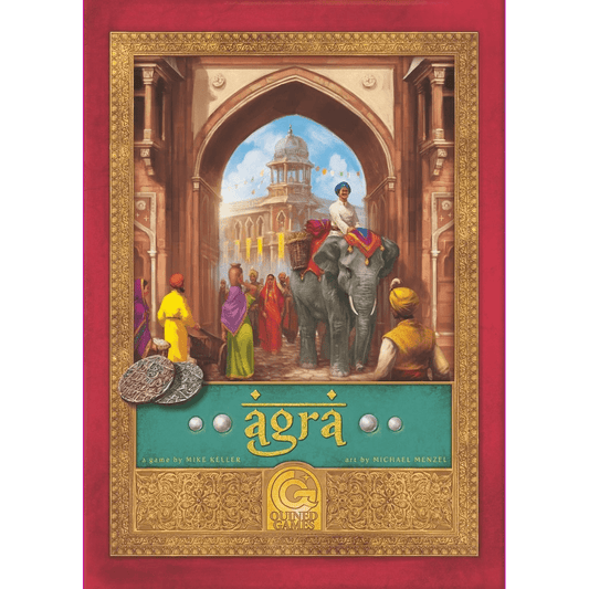 The board game Agra by Quined Games features a vibrant cover with a grand Mughal palace, ornate archway, people in traditional clothing, an elephant rider, and the title Agra adorned with silver coins and gold borders.