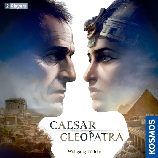 The Caesar & Cleopatra card game by Kosmos features dramatic box art of Caesar and Cleopatra facing each other with Roman and Egyptian architecture in the background. Designed for 2 players.