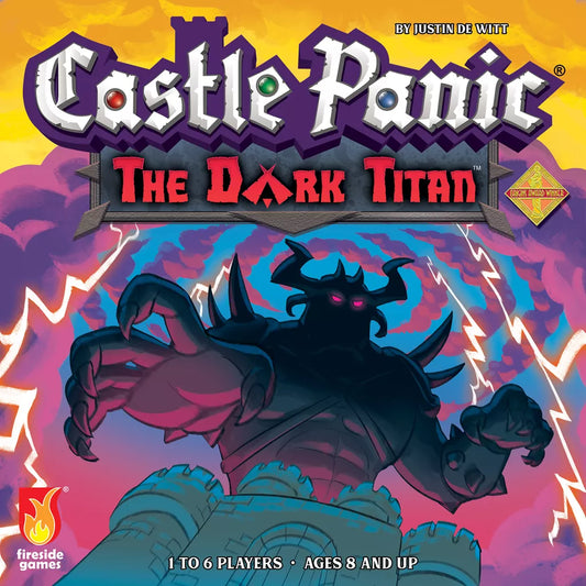 The box art for Castle Panic: The Dark Titan Expansion (Second Edition) by Fireside Games features Agranok—a towering, shadowy armored figure with glowing red eyes—looming over castle towers beneath a stormy sky. Logos and game details line the borders.