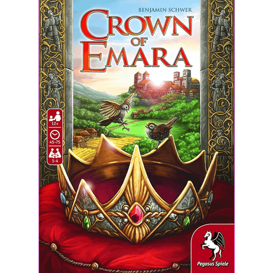 A jeweled crown sits on a red velvet cushion, evoking the Crown of Emara board game by Pegasus Spiele. In the background, two birds soar above a green countryside with a village and castle, alongside the Pegasus Spiele logo.