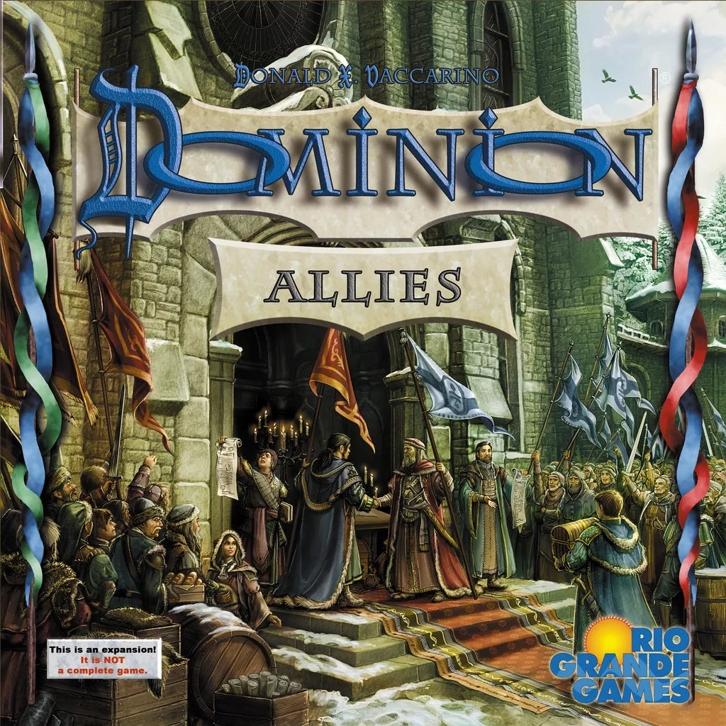 Cover art for Dominion: Allies Expansion by Rio Grande Games shows a medieval scene at a castle with people, banners, flags, and hints of new cards. The Rio Grande Games logo is displayed in the lower right corner.
