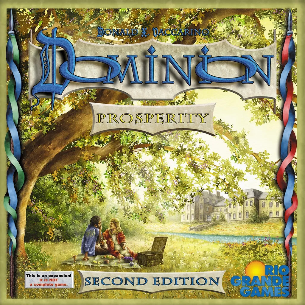 The Dominion: Prosperity Expansion (Second Edition) box features two people under a tree with a grand estate; the gold title and logo appear above, and Rio Grande Games' logo is displayed in the lower right corner.