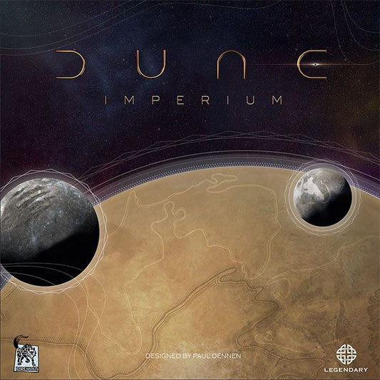 Box cover of Dune: Imperium by Dire Wolf, showing two planets above a desert landscape with stylized title text and brand logo in the corners.