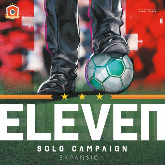 A close-up of a person’s legs with one foot on a soccer ball. The red and green background displays: Eleven: Solo Campaign Expansion by Portal Games—the must-have solo campaign and board game add-on for Eleven fans.