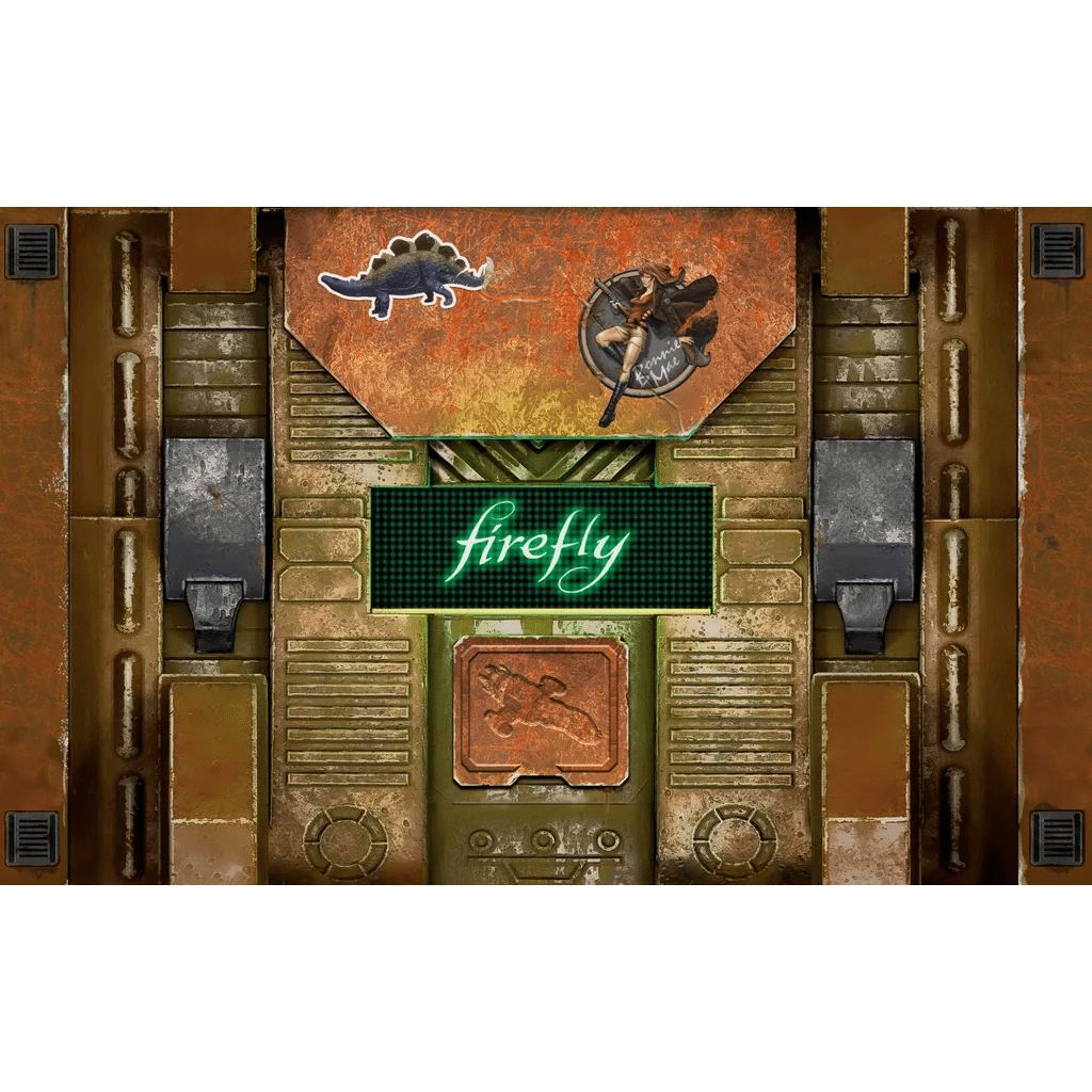 A metallic, rust-colored panel with a glowing green display reading "firefly" is adorned with dinosaur and firefly stickers—evoking the worn look of the iconic ship from Firefly: The Game – 10th Anniversary Collector's Edition by Gale Force Nine.