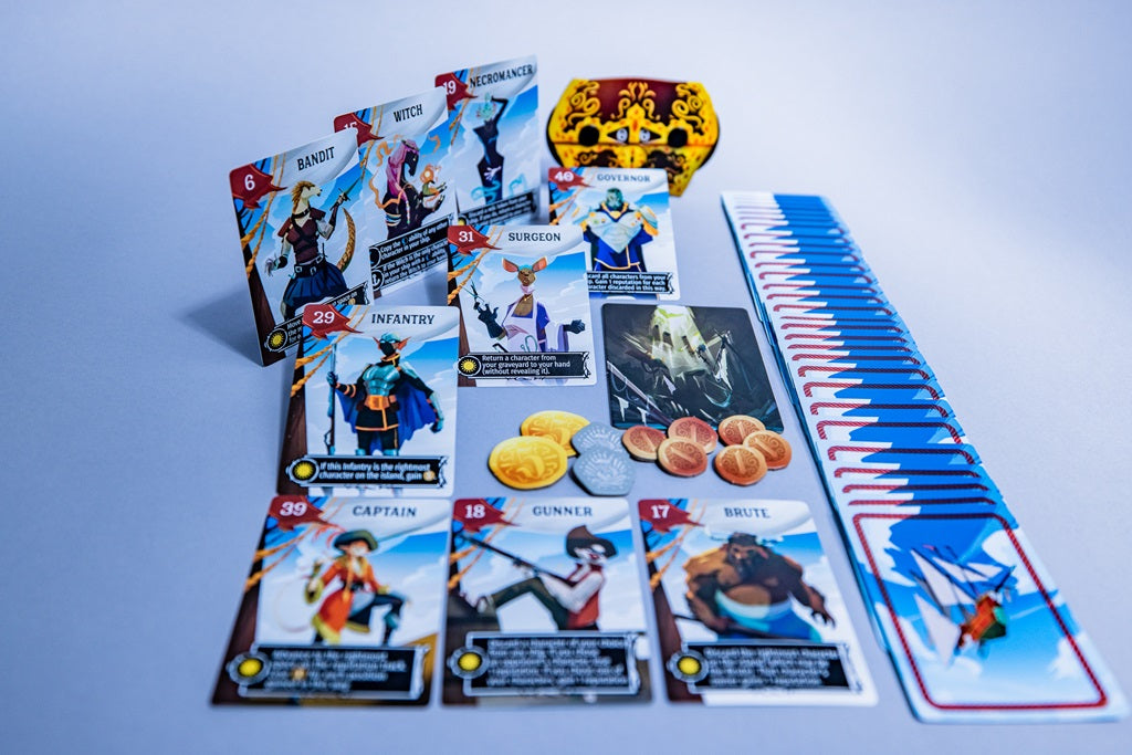 A vibrant array of playing cards from Stonemaier Games’ Libertalia: Winds of Galecrest, along with gold and silver tokens and a decorative token, are displayed on a light surface. The cards showcase illustrated pirates and nautical themes.