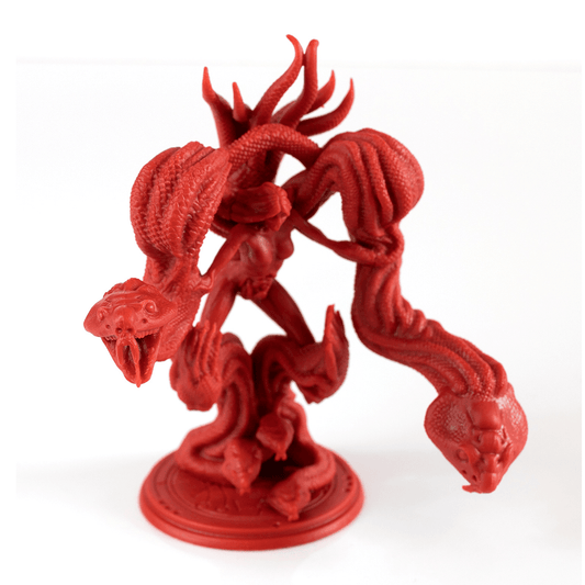 The Planet Apocalypse: Lady Scylla Expansion by Petersen Games features a red 3D-printed figurine with multiple snake heads and twisted necks, a humanoid torso, and a round base, inspired by the mythical creature Lady Scylla.