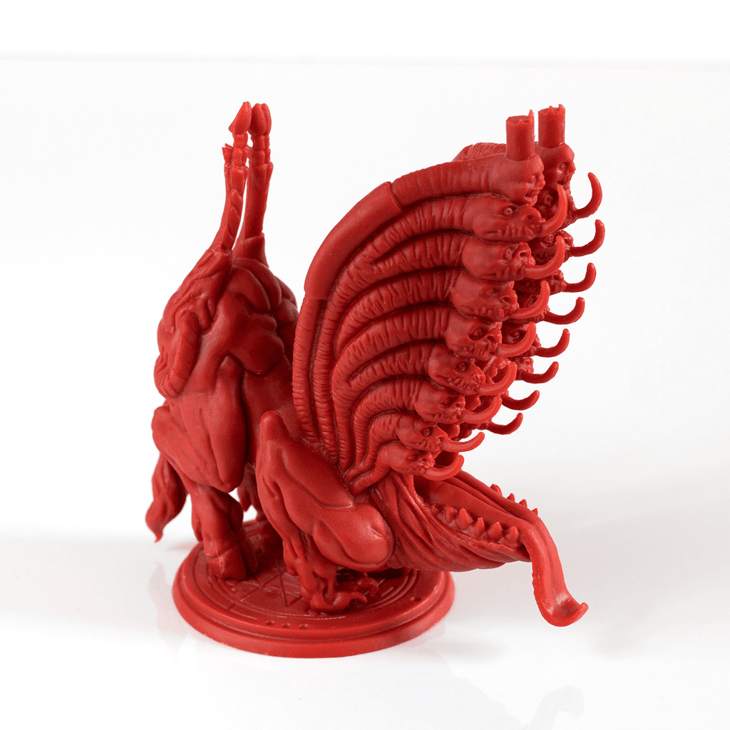 The Planet Apocalypse: Lord Asmod Expansion by Petersen Games features a red, highly detailed miniature of the Demon Lord with multiple segmented heads, tentacles, a muscular body, and clawed limbs on a circular base.