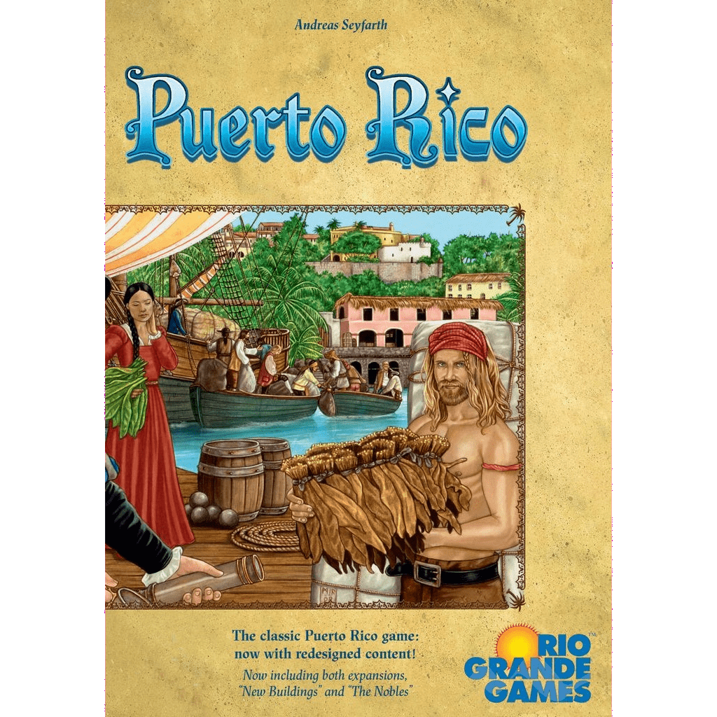 The cover of Puerto Rico: Deluxe Edition by Rio Grande Games depicts a bustling colonial port with ships, barrels, palm trees, and workers—including a man holding sugarcane—reflecting this classic plantation strategy game's vibrant setting.