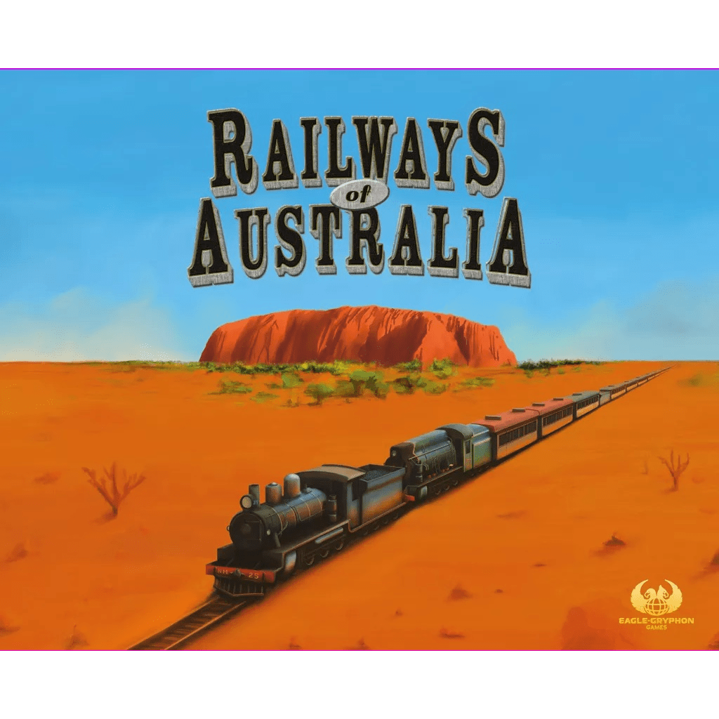 The “Railways of Australia” expansion for Railways of the World by Eagle-Gryphon Games features a steam train crossing an arid red landscape with Uluru, highlighting railway expansion despite gauge differences.