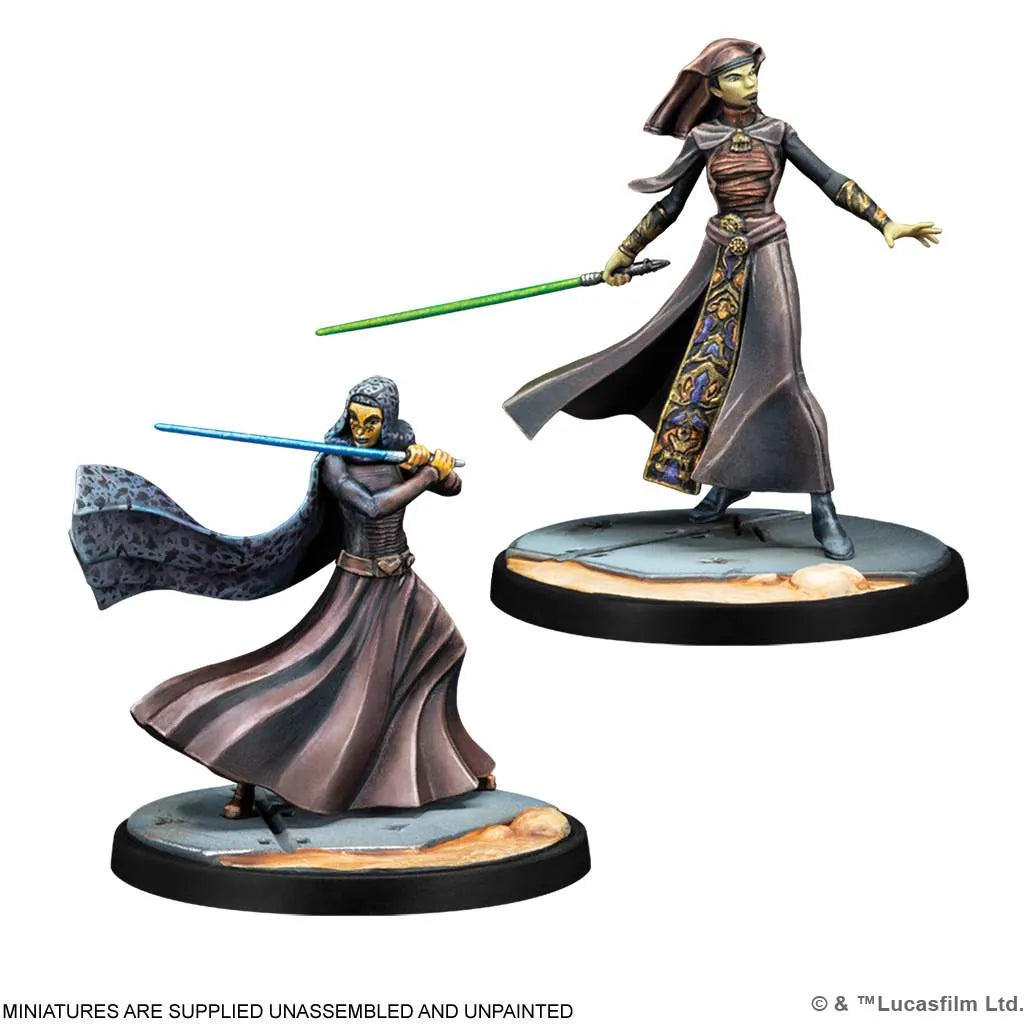 Two unpainted figures from Atomic Mass Games' Star Wars: Shatterpoint – Plans & Preparation Squad Pack stand ready on rocky bases, each with detailed robes and lightsabers reminiscent of skilled Jedi duelists.