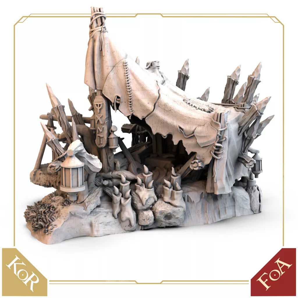 A detailed miniature fantasy tent from Awaken Realms’ Tainted Grail: Modular Campsite Expansion, featuring stitched fabric, wooden stakes, terrain, lanterns, skulls, and totems. Kings of Ruin and Fall of Avalon logos appear in the image corners.