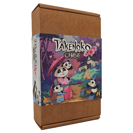 A cardboard box with a colorful label for the Matagot Takenoko New ECO Chibis expansion, featuring cartoon pandas in a vibrant outdoor setting with stylized trees and cherry blossoms.