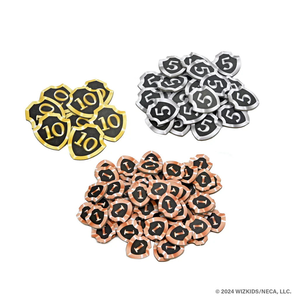 Tales of the Arthurian Knights by WizKids includes shield-shaped tokens in piles of 10 (yellow), 5 (silver), and 1 (bronze)—ideal for games about King Arthur and his knights. © 2024 WizKids/NECA, LLC.