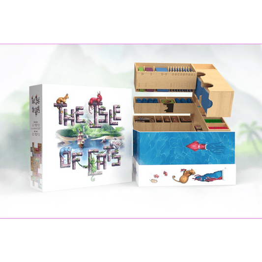 A The City of Games’ The Isle of Cats: Big Box & Wooden Insert, including Kittens + Beasts, Boat Pack, and Kickstarter Pack 2, sits beside a wooden insert holding cards, tokens, and tiles; the box shows colorful cats on an island.