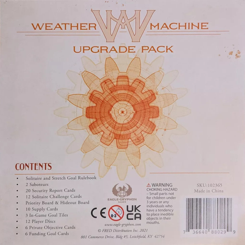 Front cover of Weather Machine: Upgrade Pack by Eagle-Gryphon Games, featuring a geometric mandala design; Solitaire Challenge Cards listed on the left, warnings and logo at the bottom, and product details on the right.