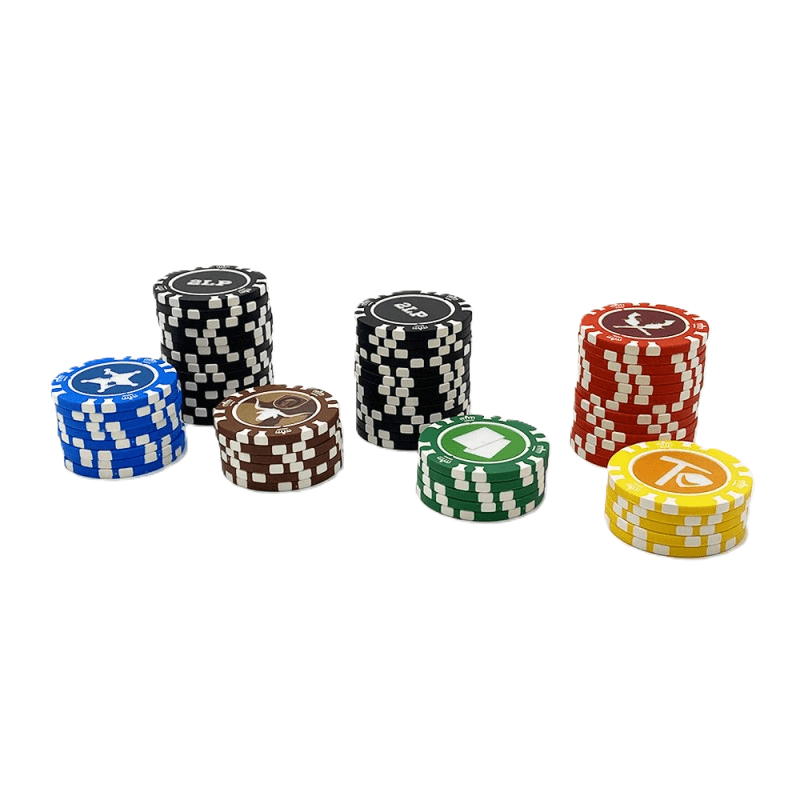 Stacks of blue, brown, black, green, red, and yellow chips from Kolossal Games’ Western Legends: The Chips That Didn't Fall FR are arranged on a white background. Each chip displays a unique top symbol inspired by Legendary tokens.
