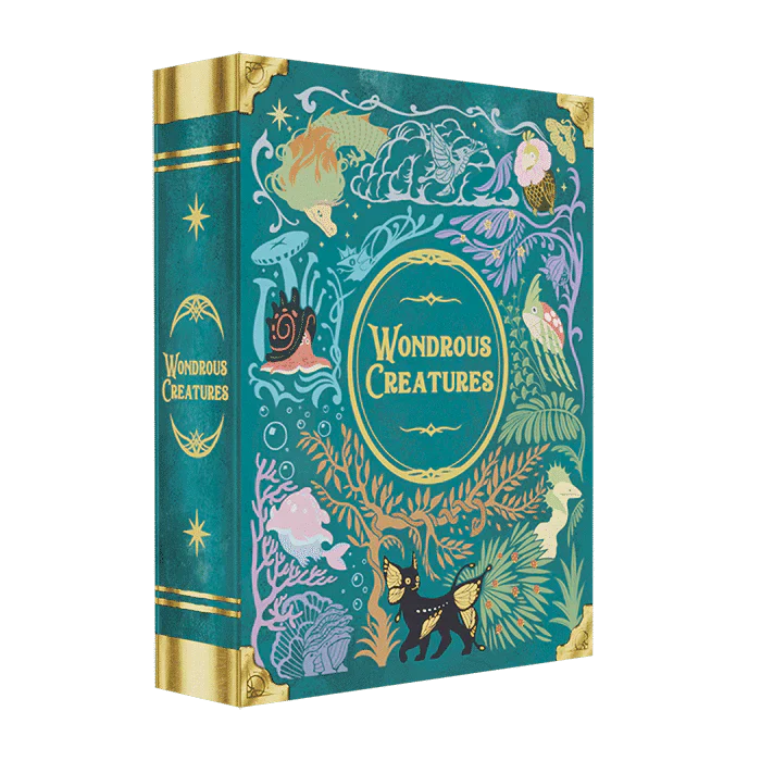 Wondrous Creatures by Bad Comet is a teal hardcover book with gold accents, showcasing whimsical illustrations of mythical animals, plants, fish, and faces for a magical, fantasy-inspired look.
