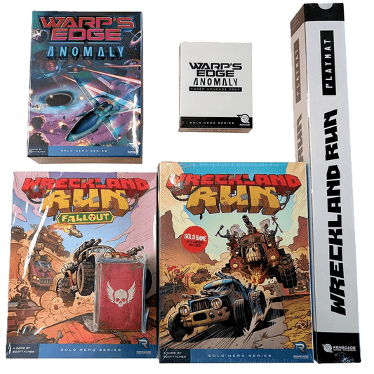 A set of board game items from Renegade Game Studios, featuring the Wreckland Run (Kickstarter Wreck & Roll Pledge), Warp's Edge Anomaly, a card deck, playmat tube, and a small metal box with a skull logo.