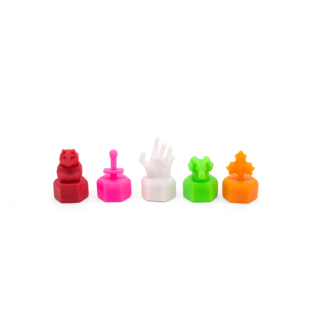 Five vibrant keycap figurines from Chip Theory Games' "Wroth: All Gameplay" are arranged on hexagonal stands, featuring a red cat, pink joystick, white hand, green frog, and orange maple leaf—each evoking area control board games.