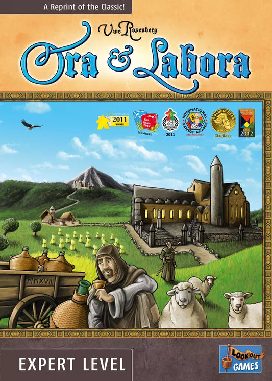 The Ora et Labora board game by Lookout Games features a cover with a medieval monk holding a scroll, grazing sheep, hay-filled fields, a village with church and mountains, and award logos displayed at the top.