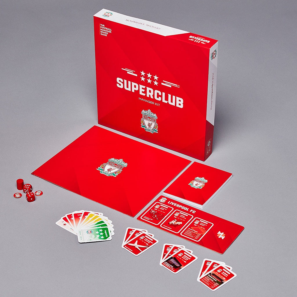 The Superclub: Liverpool Manager Kit by Superclub features a red box, red game board, manager folder, cards, dice, tokens, and Liverpool FC-themed materials displayed on a gray surface.